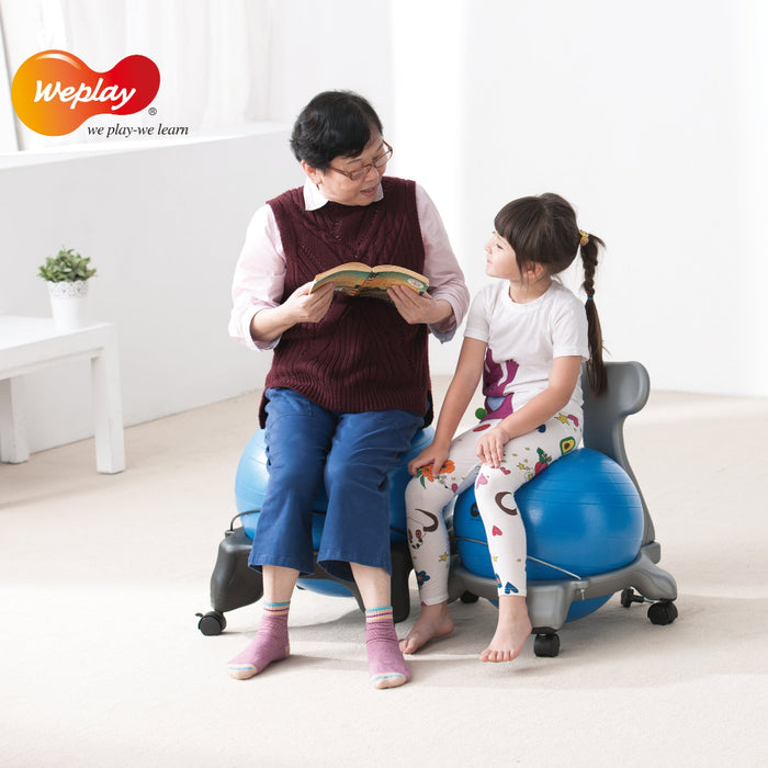 Adult and child on ball chair