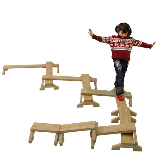 Child walking along balance beams