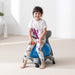 Girl sitting on a  ball chair